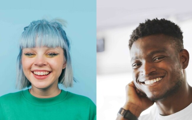 Zwei junge Menschen lächeln in die Kamera: links eine junge Frau mit hellblauen Haaren im grünen Shirt, rechts ein junger Mann im weißen T-Shirt.