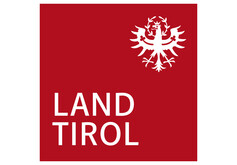 Rotes Logo mit weißem Tiroler Adler und Schriftzug „Land Tirol“.
