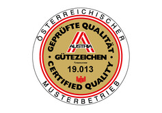 Logo.  Eine Art Goldmedaille mit schwarzer Schrift unf umringt von der Österreich Flagge.